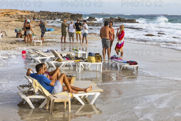 Bathers in front of the trendy beach bar Sa Trinxa on Salines beach, Ibiza, Balearic Islands, Mediterranean Sea, Spain, Europe