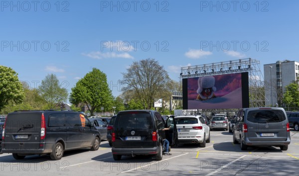 Temporary drive-in cinema, in the car park in front of Messe Essen, Grugahalle, large LED screen also allows film screenings in the sunshine, family film, effects of the corona crisis in Germany