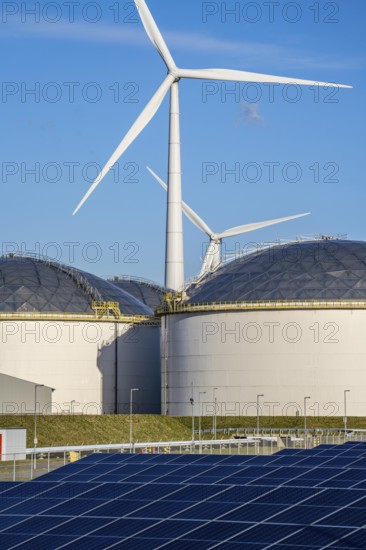 Vopak Solarpark Eemshaven, 19 hectares of solar modules with a capacity of 25 megawatts, around the Vopak tank terminal in the industrial harbour of Eemshaven, wind farm, Groningen, Netherlands