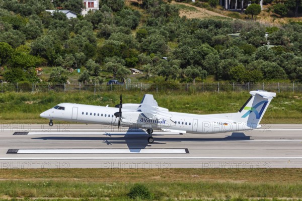 A De Havilland Dash 8 Q400 aircraft of Avanti Air with the registration D-AASH at Skiathos Airport, Greece, Europe