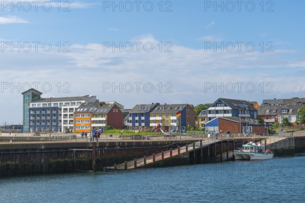 North-east harbour of the offshore island of Heligoland, guesthouses and atoll ocean resort on the waterfront promenade, North Sea, Pinneberg district, Schleswig-Holstein, Germany, Europe