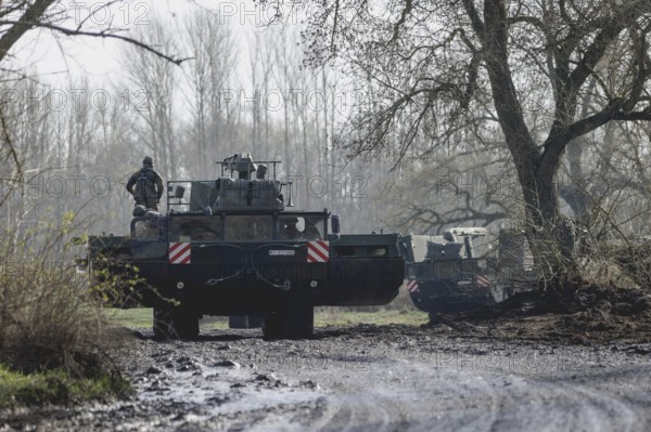 Amphibious vehicles of the type Amphibie M3 of the Bundeswehr taken during the military exercise 'Wettiner Schwert' near Tangermünde, 26.03.2024. 'Wettiner Schwert' is part of the Quadriga exercise of the Bundeswehr and the NATO large-scale manoeuvre Steadtfast Defender 2024