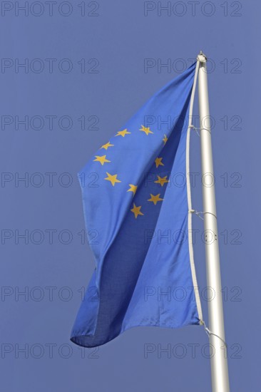 European flag in front of a blue sky