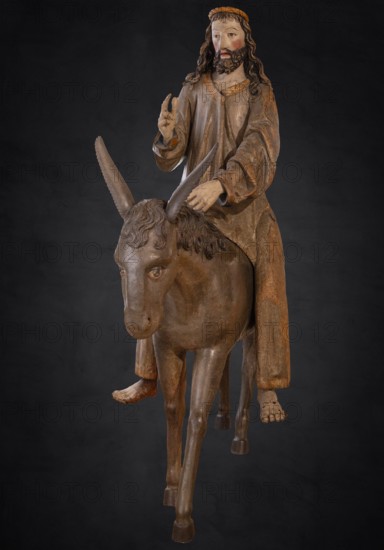 Palm tree donkey, wooden figure from 1470, on a dark background, Franciscan Museum, Villingen, Baden-Württemberg, Germany, Europe