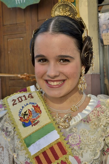 Girl from the Falla group "La Font" wearing traditional dress at the Las Fallas Spring Festival, Pego, Province of Alicante, Spain, Europe