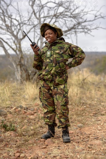 Ranger of the anti-poacher unit Black Mambas with Funfgerät, Balule Game Reserve, Limpopo Province, South Africa, Africa