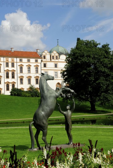 Ducal Castle, Guelph Castle, built in 1292, bronze sculpture of the stallion Wohlklang in liberty dressage, Ulrich Conrad, Celle, Lower Saxony, Germany, Europe