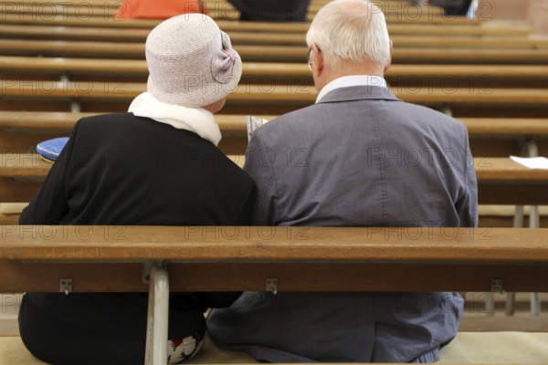 Faithful couple in a church service