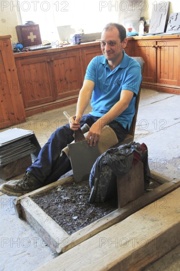 Demonstration of slate working, National slate museum, Llanberis, Gwynedd, Snowdonia, north Wales, UK