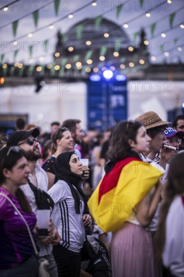 Scenes in the fan zone on Platz der Republik in front of the Reichstag building taken in Berlin, 29 June 2024 during the broadcast of the football match between Denmark and Germany