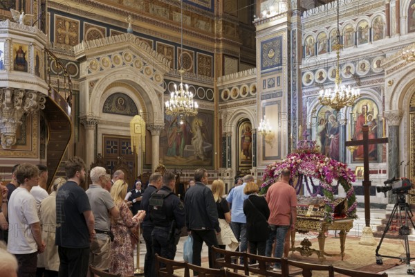 Worshippers at the Good Friday ceremony, Greek Orthodox Cathedral of the Annunciation, Mitropolis, Athens, Greece, Europe