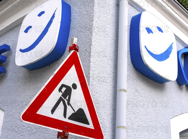 Smiling smiley face above a traffic sign, Bad Reichenhall, Bavaria, Germany, Europe