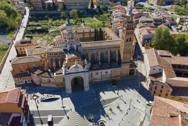 Aerial view of an impressive cathedral with adjoining entrance gate and surrounding historic buildings, Aerial view, Cathedral, Catedral de Santa Maria de la Huerta, Tarazona, Zaragoza, Aragon, Spain, Europe