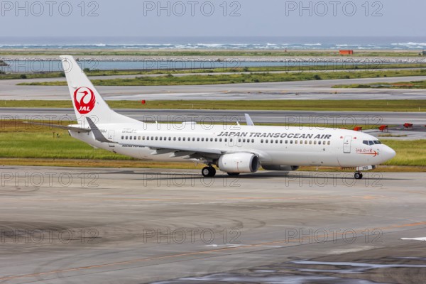 A Boeing 737-800 aircraft of Japan Transocean Air with the registration JA350J at Okinawa Airport (OKA) in Naha, Japan, Asia