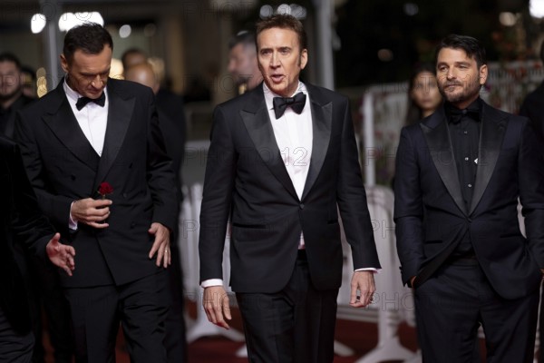 Cannes, France, 17.5.2024: Julian McMahon, Nicolas Cage and Justin Rosniak at the premiere of The Surfer on the red carpet of the Palais des Festivals during the 77th Cannes International Film Festival. The 77th Cannes International Film Festival will take place from 14 to 25 May 2024, Europe