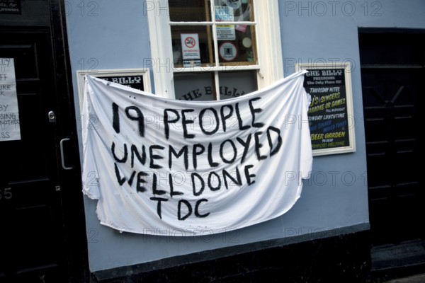 Protest banner on closed pub 'The Billy' against Tendring District Council Harwich, Essex, England, UK