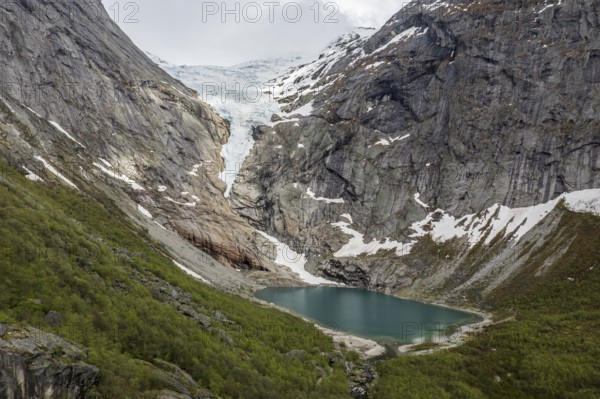 Aerial view of glacier Briksdalsbreen, a glacier tongue of Jostedalsbreen, glacier lake, Norway, Europe