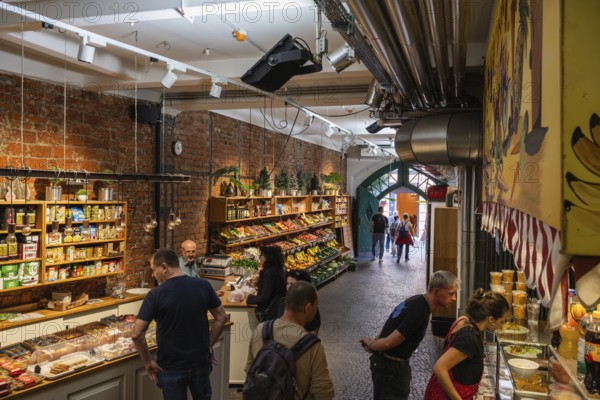 International, culinary specialities in the Freiburg market hall in the historic old town of Freiburg im Breisgau, Baden-Württemberg, Germany, Europe