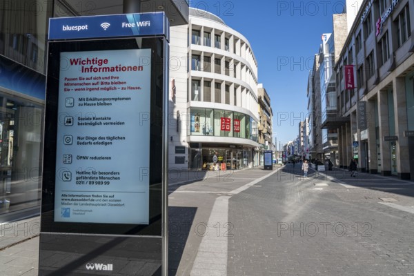 Advertising displays, give advice on correct behaviour, empty city centre, shopping street, Schadowstraße, effects of the coronavirus pandemic in Germany, Düsseldorf