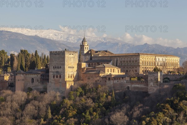 Alhambra on the Sabikah hill, Moorish city castle, Nasrid palaces, behind the snow-covered Sierra Nevada, Mirador de San Nicolas, Granada, Andalusia, Spain, Europe