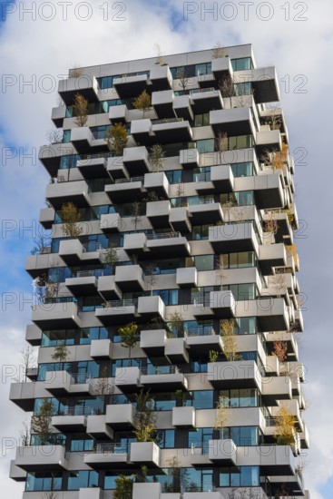 High-rise residential building with integrated planted trees, housing, architecture, rent, rent price, housing shortage, construction, construction industry