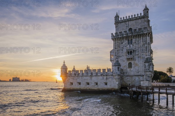 Belem Tower or Tower of St Vincent, famous tourist landmark of Lisboa and tourism attraction, on the bank of the Tagus River Tejo on sunset. Lisbon, Portugal, Europe