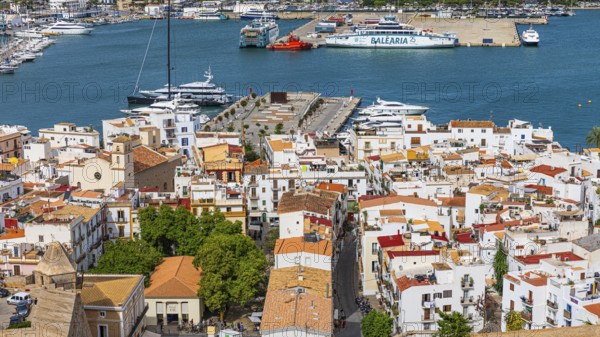 Above the rooftops of the old town of Eivissa, Ibiza Town, with views of the harbour, Ibiza, Balearic Islands, Mediterranean Sea, Spain, Europe