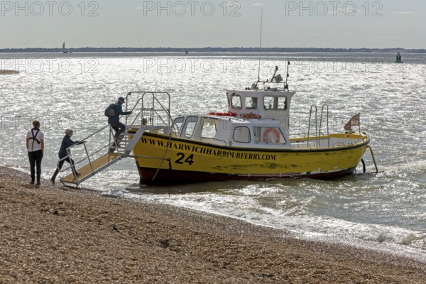 Harwich Harbour Ferry boat passengers boarding at Felixstowe, Suffolk, England, UK