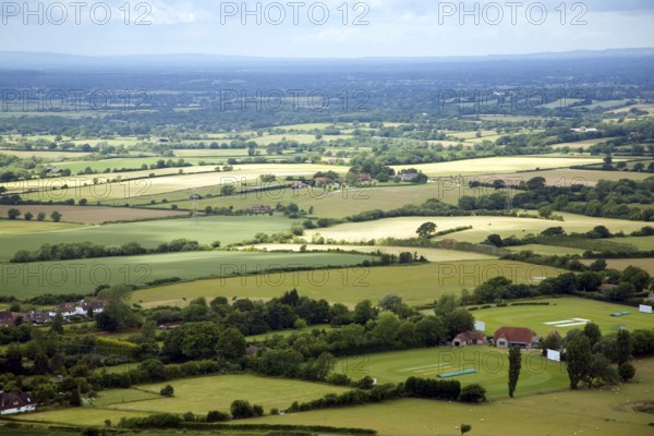 View over patchwork of fields in the Weald near Fulking, West Sussex, England, United Kingdom, Europe