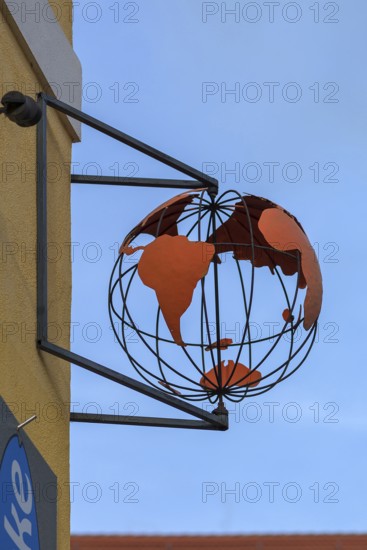 Globe as nose sign of a travel agency, Sulzbach-Rosenberg, Upper Palatinate, Bavaria, Germany, Europe