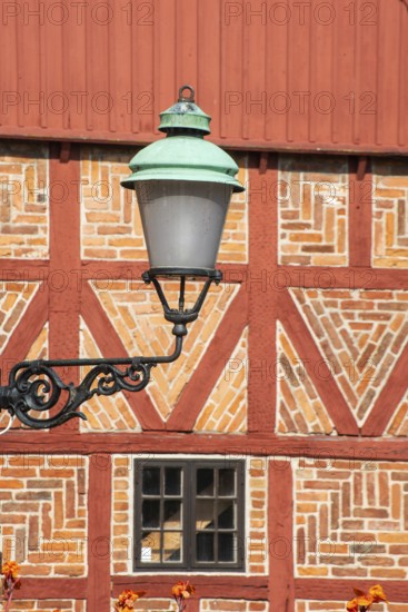 Old street lamp at a half timbered wall in Ystad, Skåne County, Sweden, Scandinavia, Europe