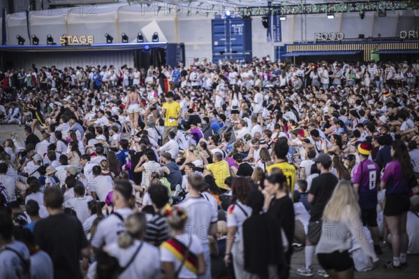 Scenes in the fan zone on Platz der Republik in front of the Reichstag building taken in Berlin, 29 June 2024 during the broadcast of the football match between Denmark and Germany