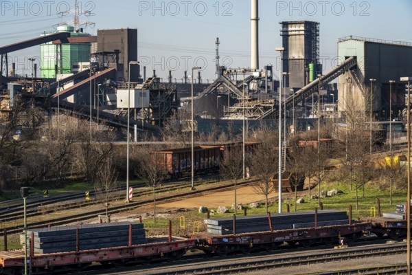 Coking plant of HKM, Hüttenwerke Krupp-Mannesmann in Duisburg-Hüttenheim, diesel locomotive with wagons, steel slabs, Duisburg, North Rhine-Westphalia, Germany, Europe