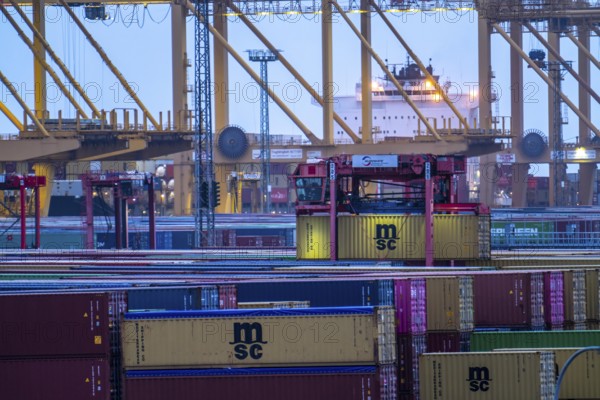 Container terminal in the seaport of Bremerhaven, Eurogate Container Terminal with almost 50 container gantry cranes, cranes, on a length of over 4 KM at the mouth of the Weser, straddle carriers bring the containers to and from the container ships, or store them between, Bremerhaven, Bremen, Germany, Europe