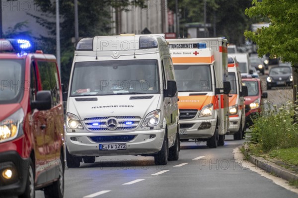 Fire engines from Essen, Mülheim and Oberhausen, with 140 firefighters, on the way to an emergency exercise, column journey with 30 emergency vehicles, with flashing blue lights and sirens, Essen, North Rhine-Westphalia