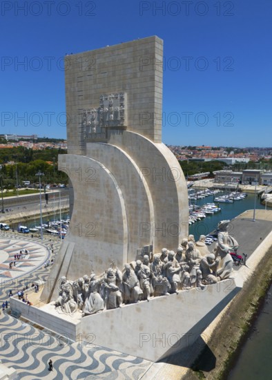 Riverside monument with several statues under a clear sky in an urban environment on a summer day, aerial view, Monument, Padrão dos Descobrimentos, Monument to the Discoveries, Tagus River, Belém neighbourhood, Lisbon, Portugal, Europe