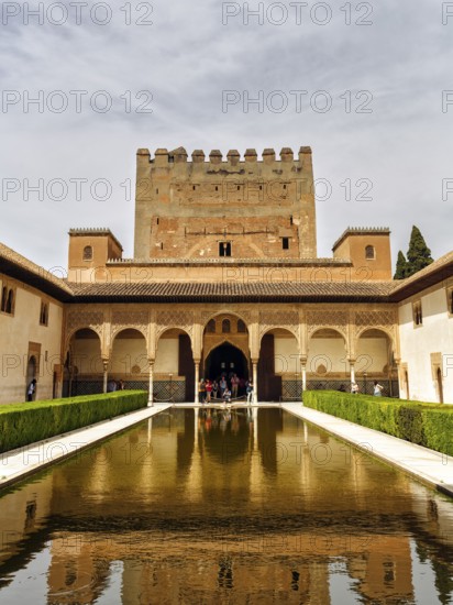 Myrtle courtyard with water basin and Torre de Comares, arabesque Moorish architecture, Nasrid palaces, Alhambra, Granada, Andalusia, Spain, Europe