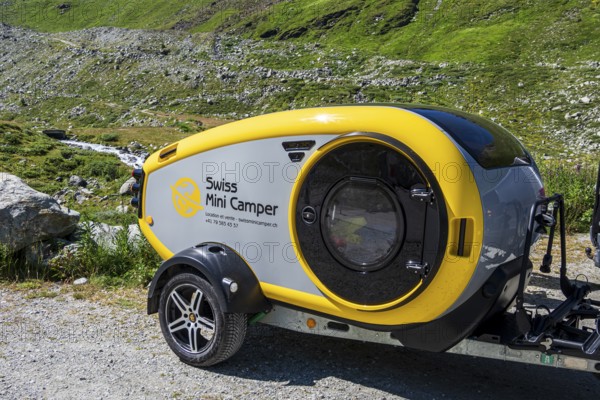 Mini caravan without standing height, swiss mini camper, Moiry glacier in the back, Valais, Switzerland, Europe