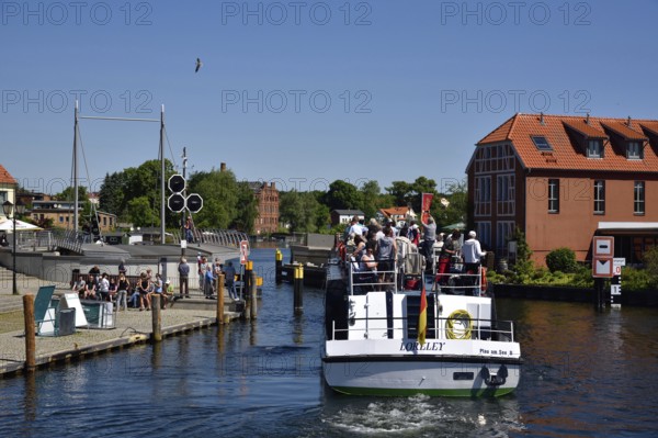 Europe, Germany, Mecklenburg-Western Pomerania, island town of Malchow, Lake Malchow, at the swing bridge, motorboat, Malchow, Mecklenburg-Western Pomerania, Germany, Europe