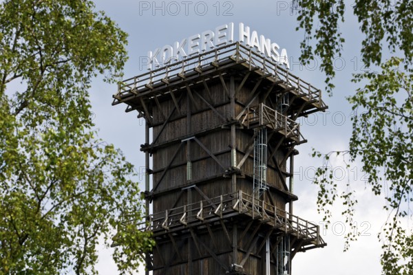 The extinguishing tower with the lettering of the Hansa coking plant, landmark in Dortmund-Huckarde, Ruhr area, North Rhine-Westphalia, Germany, Europe