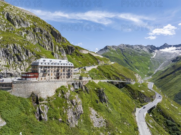 Hotel Belvédère on the Furka, the most famous pass hotel in the world. The building is closed and falling into disrepair. A lost place. Drone photo. Obergoms, Canton Valais, Switzerland, Europe