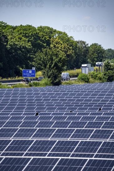 Solar park near Neukirchen-Vluyn, along the A40 motorway, over 10, 000 solar modules spread over 4.2 hectares, generating 6 million kilowatt hours per year, North Rhine-Westphalia, Germany, Europe