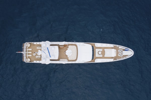 Aerial view motor yacht in front of the Principality of Monaco, French Riviera, Mediterranean Sea