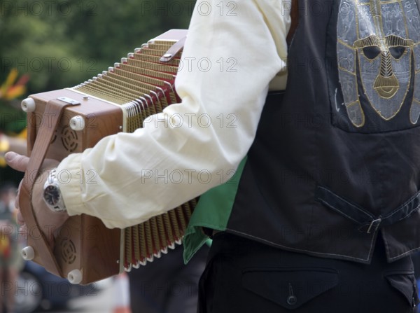 Accordion player for Morris dancers at country folk event, Shottisham, Suffolk, England, United Kingdom, Europe