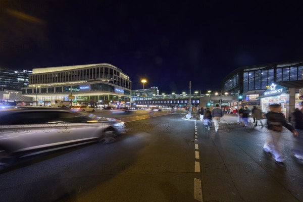 Zoologischer Garten railway station, Primark shop, vehicles and pedestrians with motion blur at Hardenbergplatz at night in Berlin, capital city, independent city, federal state Berlin, Germany, Europe