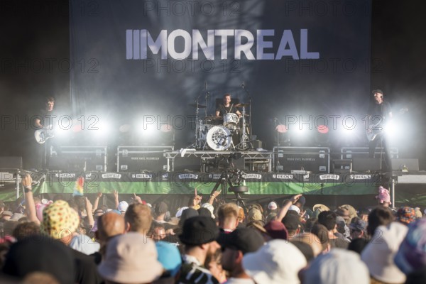 Yonas Farag (bassist), Max Power (Maximilian Seibt, drummer) and Deer (Sebastian Sievers, guitarist) from the band Montreal on the Green Stage at the Highfield Festival on Friday, Störmthaler See, 16/08/2024