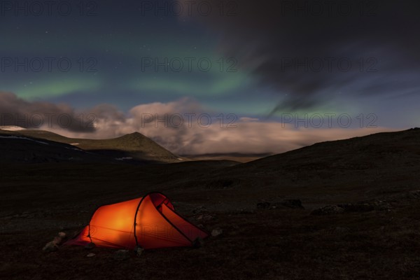 Tent in mountain landscape, Sarek National Park, World Heritage Laponia, Norrbotten, Lapland, Sweden, night shot, lighting, Scandinavia, Europe