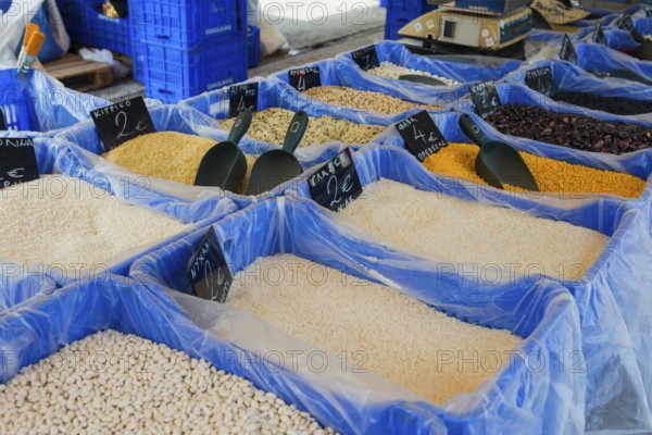 Variety of rice and pulses in large containers at a market, market, Nafplio, Nauplia, Nauplion, Nafplion, Argolis, Peloponnese, Greece, Europe