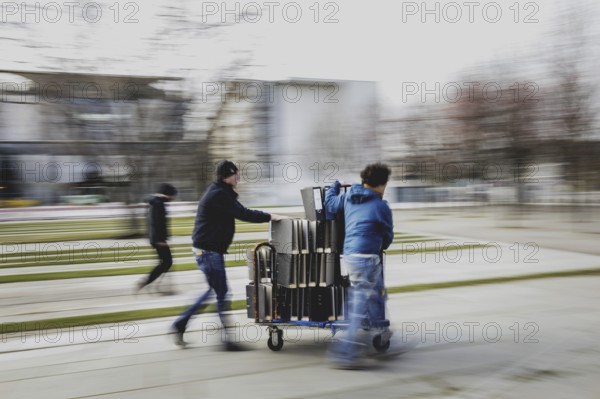 Files are cleared away after a protest action by the German Confederation of Skilled Crafts in front of the Federal Chancellery in Berlin, 26 February 2024. The German Confederation of Skilled Crafts demonstrates against the economic policy of the federal government as well as the high level of bureaucracy and the improvement of location conditions