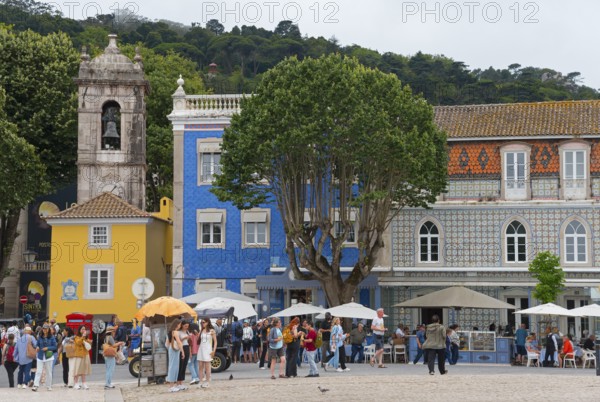 Lively square with people in front of colourful buildings and large trees, Praça da República, Republic Square, Sintra, Lisbon, Portugal, Europe